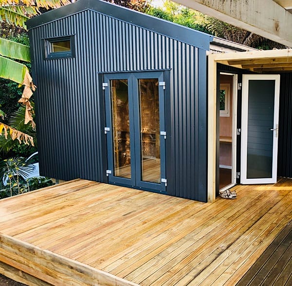 Fox Den Mezzanne Cabin with EcoWindows Joinery with deck connecting to the house