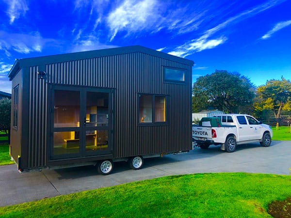 Tiny Home being towed by truck, ute