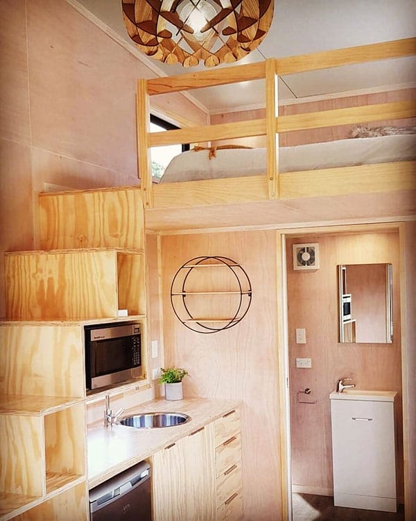 Tiny House storage stairs in ply, showing kitchen