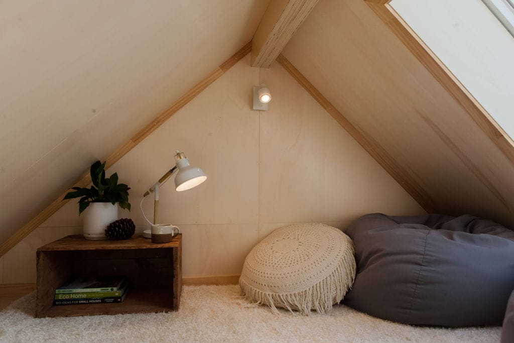 The Mezzanine Level showing the Velux Opening Skylight window in the Everest Tiny Home by Fox Cabins, Raglan.