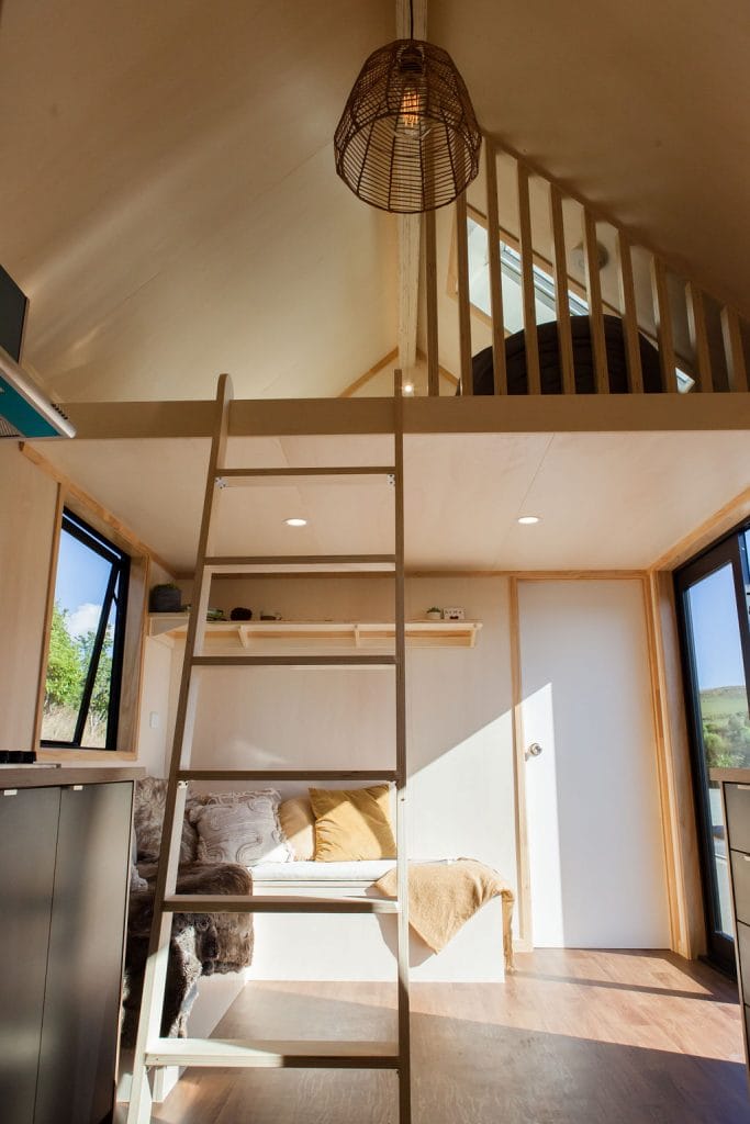 The Mezzanine Level showing the Velux Opening Skylight window in the Everest Tiny Home by Fox Cabins, Raglan.