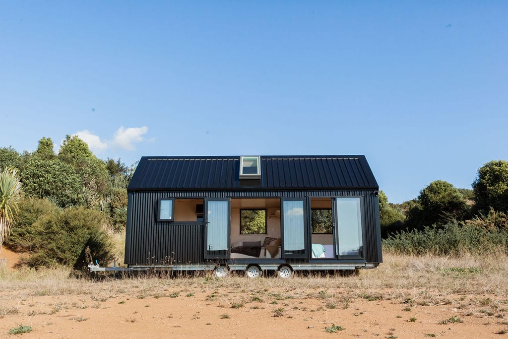 The Everest Tiny Home by Fox Cabins, ideal for Airbnb. In Ebony Black Colorsteel Cladding.