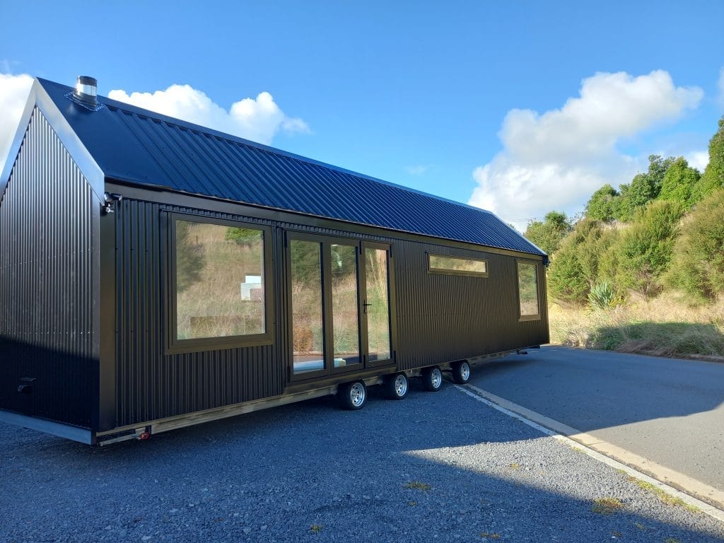 The Everest XL - 13.5 Meter Long Tiny Home leaving the Fox Cabins factory at Raglan