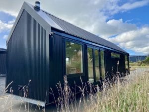 The Everest XL Tiny Home by Fox Cabins. Ideal for a larger Airbnb or family living. In Ebony Black Colorsteel Cladding.