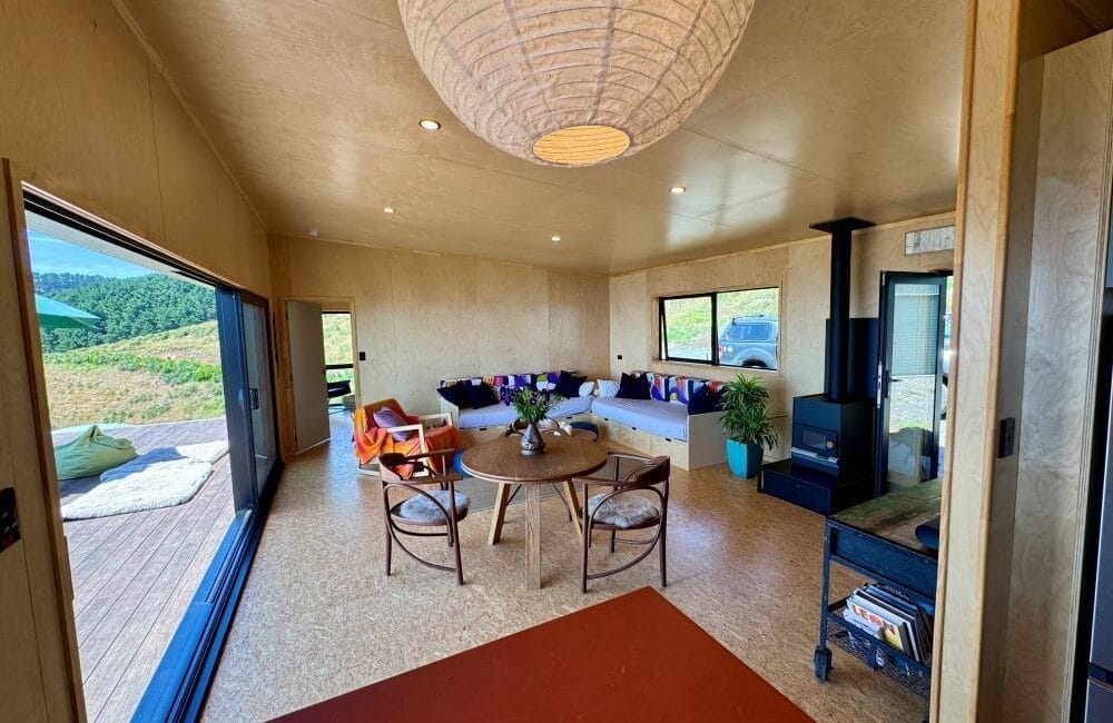 Livingroom looking from the kitchen, The Bach 60m2 prefabricated Home by Fox Cabins, Feb 2025