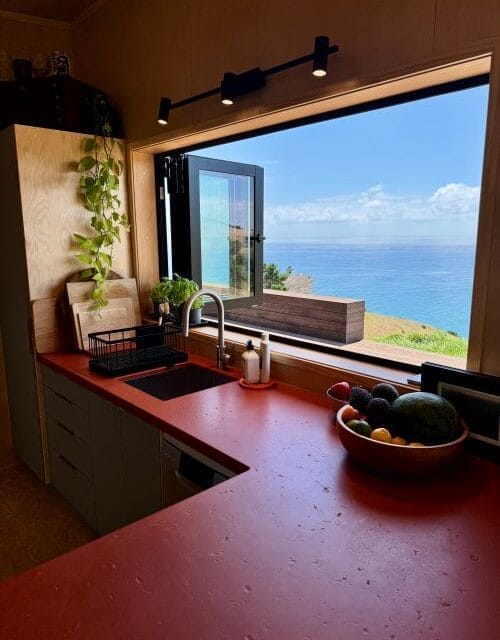 View from the Kitchen window, The Bach Prefabricated Two Bedroom 60m2 Home by Fox Cabins